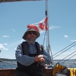 Mike at helm